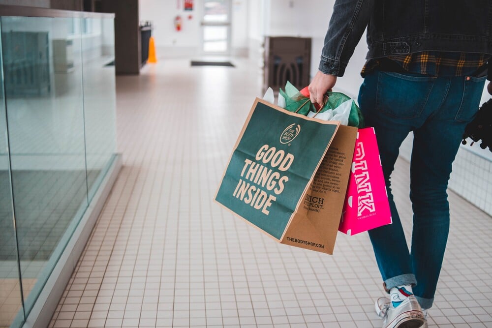 man with shopping bags