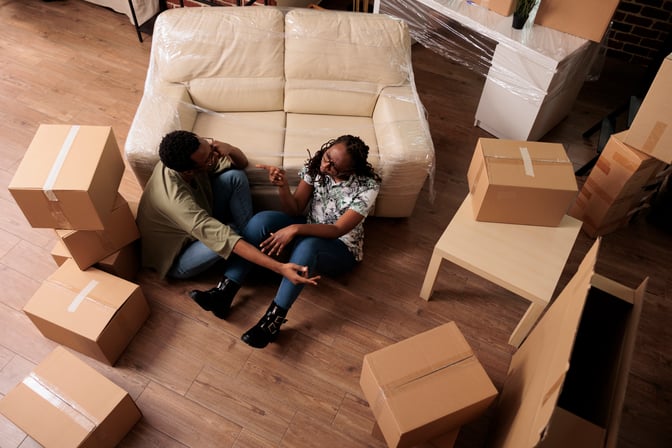 romantic-people-relaxing-together-living-room-floor-talking-about-decorations-future-family-enjoying-relocation-taking-break-after-moving-relationship-achievement-top-view